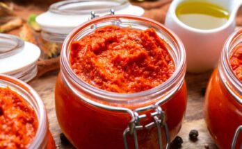 closeup raw ajvar table with vegetables sauces 683x1024