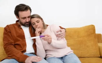 medium shot couple with pregnancy test 11zon.webp